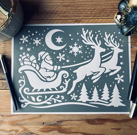 Pochoir Adhésif 30 x 20 cm Rennes & Traineau Père Noël