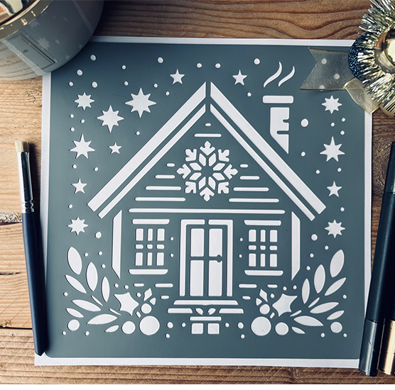 Pochoir Adhésif 20 x 20 cm Chalet de Noël & Houx